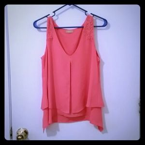 Sleeveless coral blouse
